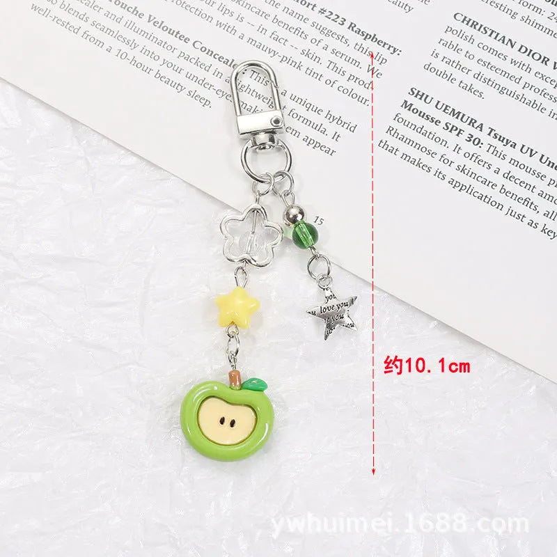 Plastic resin mobile phone charm keychain with fruit patterns including apple and strawberry designs