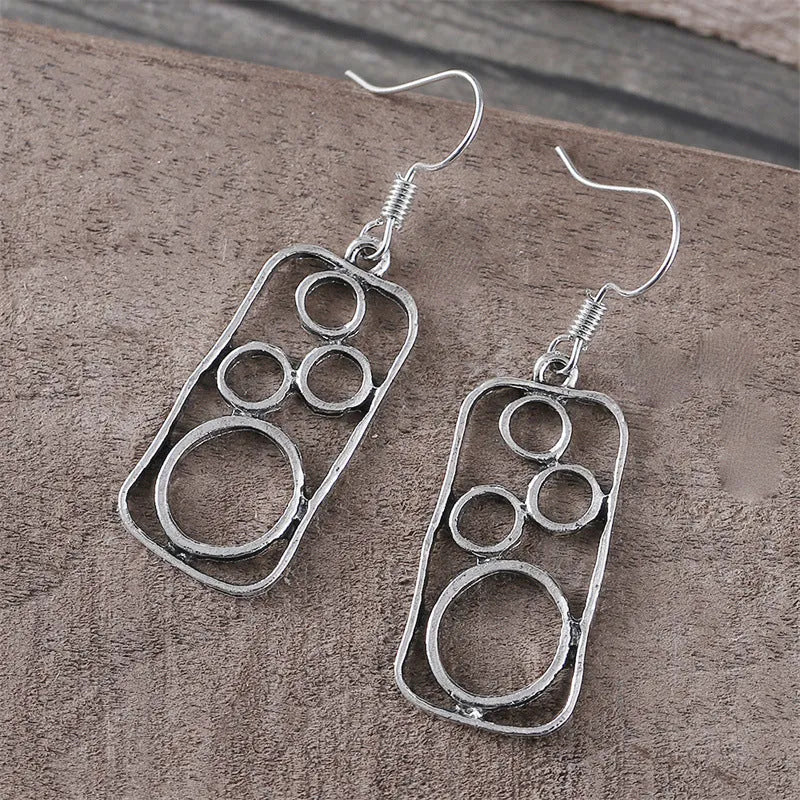 Geometric round ring earrings with irregular square shape in antique silver colour