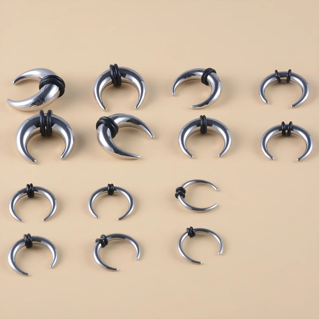 C-shaped nose ring in 316 stainless steel with a buffalo horn detail, shown in black and steel colour finishes.