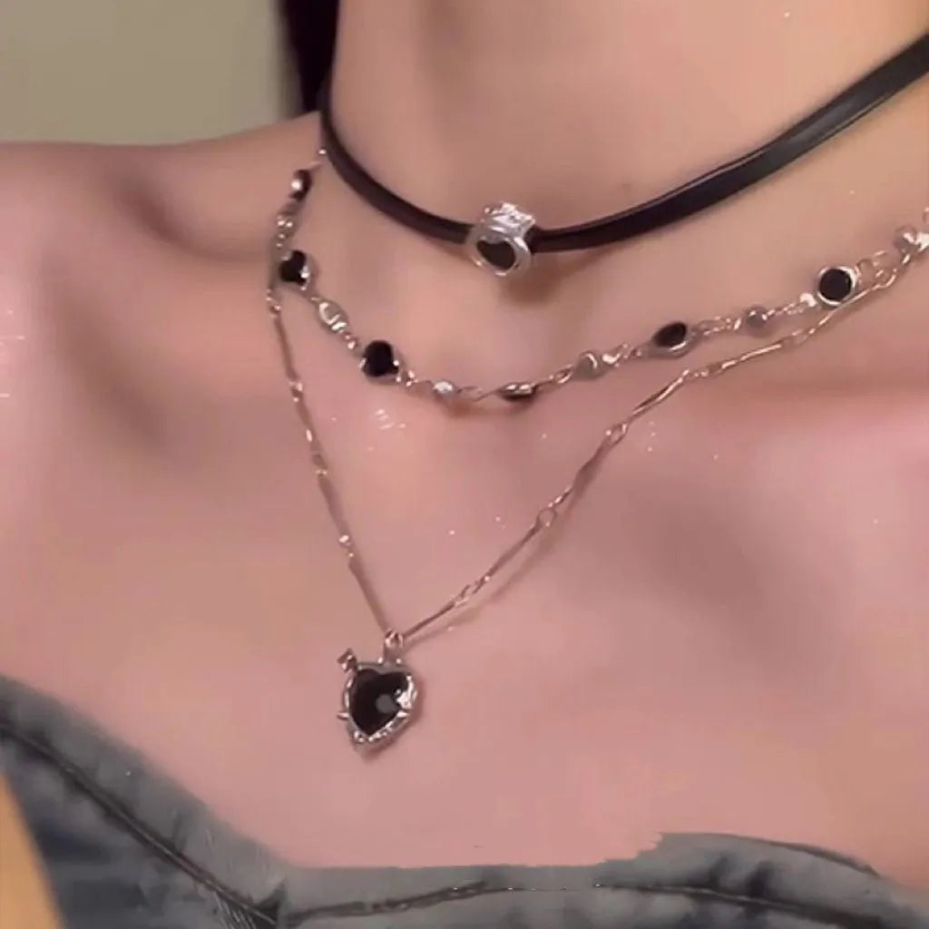 Women's multi-layer necklace set with adjustable leather heart pendants on alloy chain