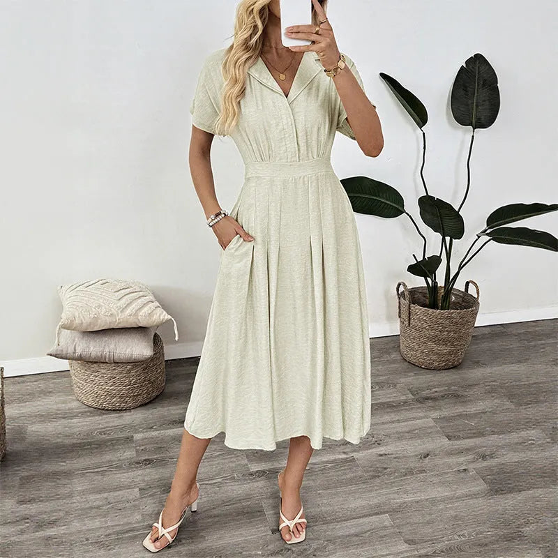 Light green women's shirt dress with a lapel collar, waist tie belt, and a chest pocket.