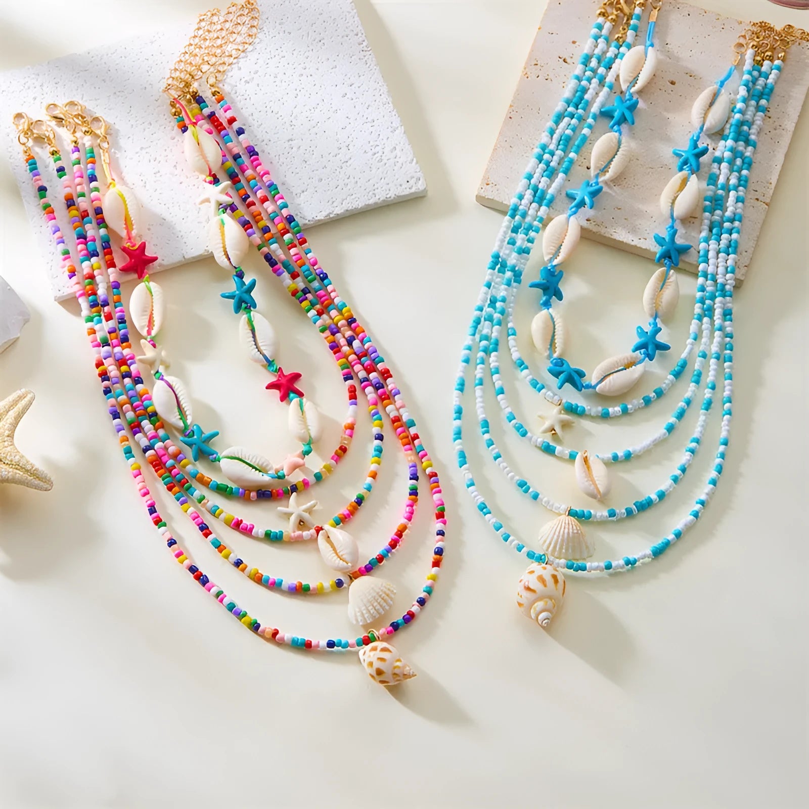 Multi-layer women's necklace with starfish shell pendants on adjustable bead chain
