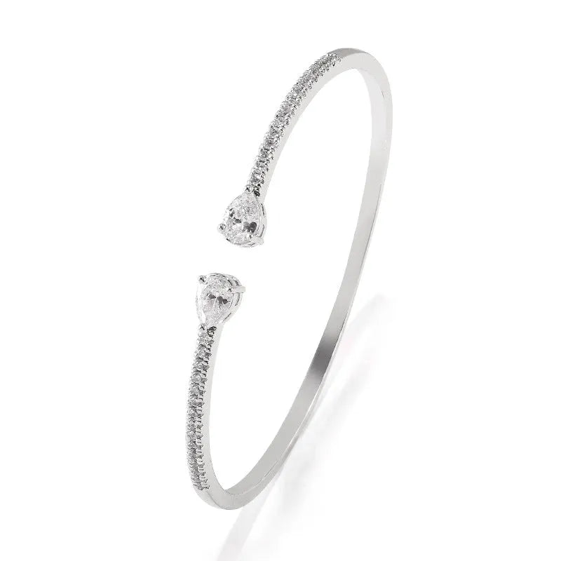 Copper personalised bracelet with multi-zircon inlaid design in simple style, shown in blue and white colour options.