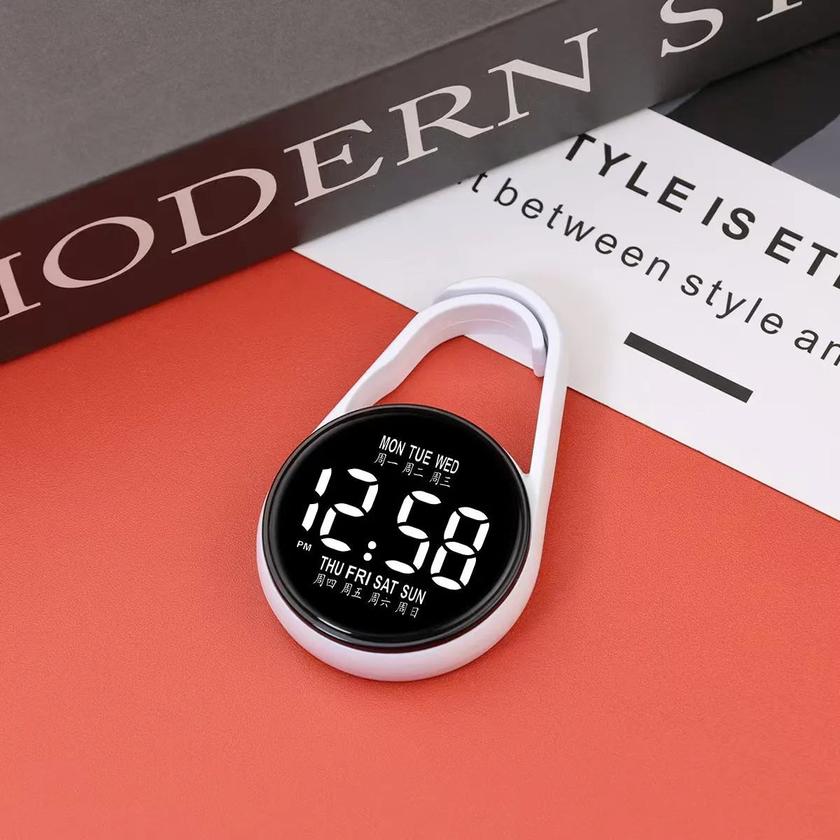 LED digital wristwatch showing time and week day on display, with plastic strap.