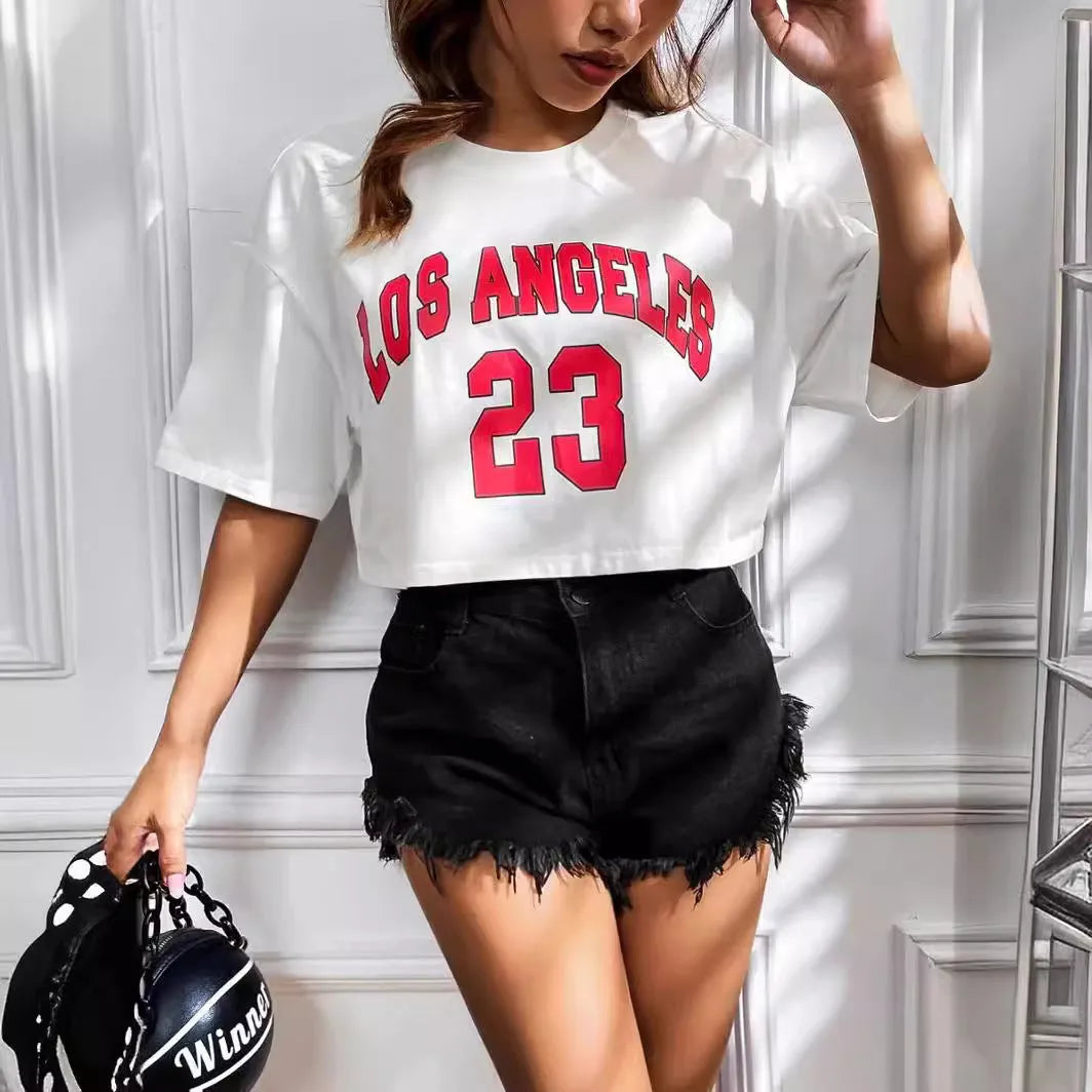 Women's black cotton t-shirt with white printed English letters, loose fit, short sleeves, and exposed navel design.