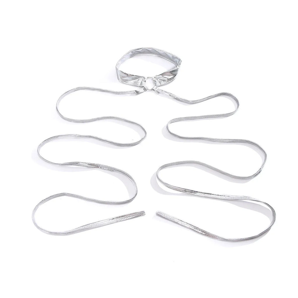 Silver alloy women's thigh chain with lace-up ties and a geometric cross design.
