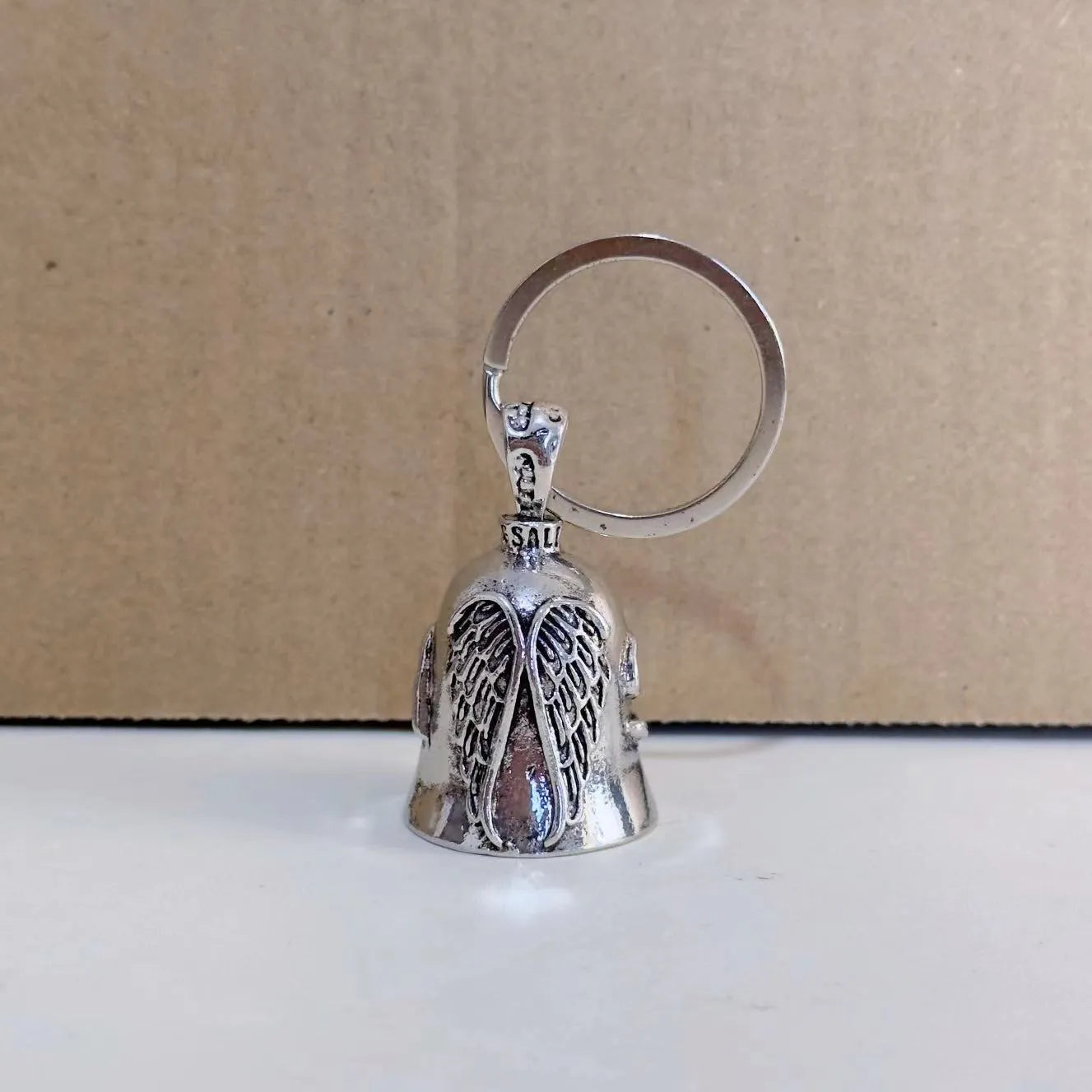 Vintage white angel feather alloy keychain and necklace set with electroplated finish.