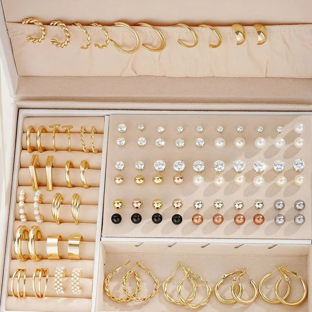 108 gold and yellow geometric alloy pearl earrings arranged in a set.