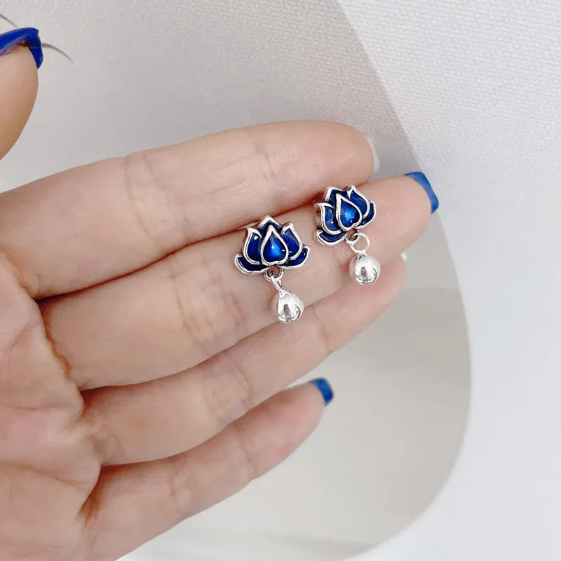 Blue lotus earrings with retro artistic design featuring lotus seedpod tassel detailing on 1.2cm wide ear studs