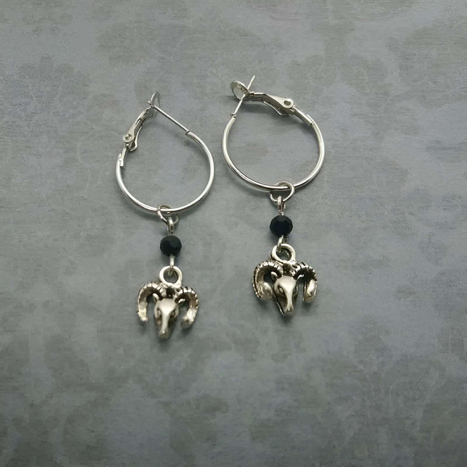 Silver Tibetan antelope design round ring earrings for women