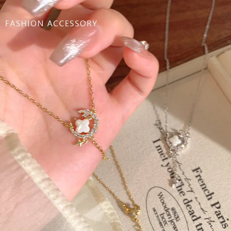 Gold star and moon pendant necklace with zirconium crystal on adjustable copper chain