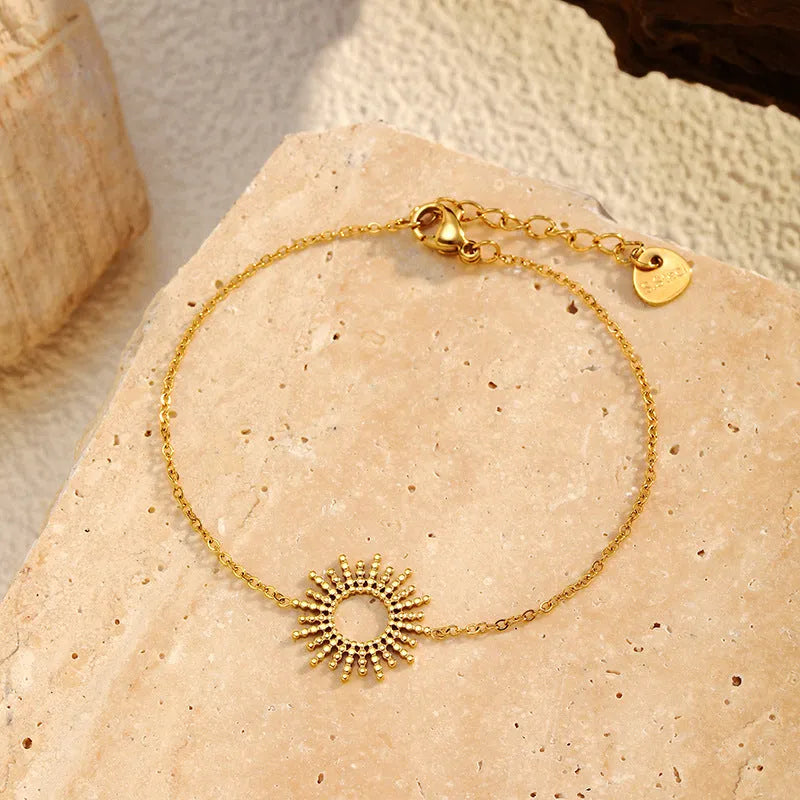 Sunflower Series gold necklace and bracelet set with geometric chain design