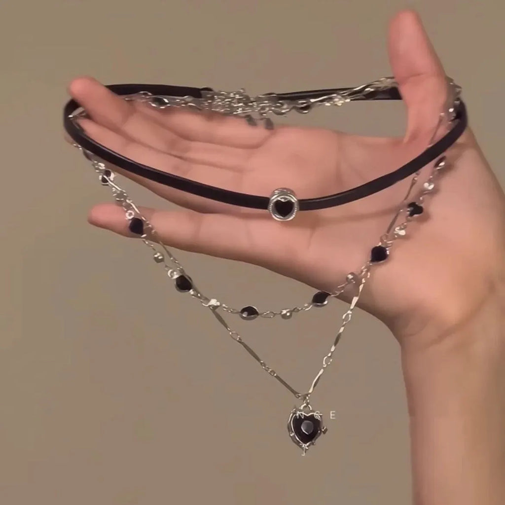 Women's multi-layer necklace set with adjustable leather heart pendants on alloy chain