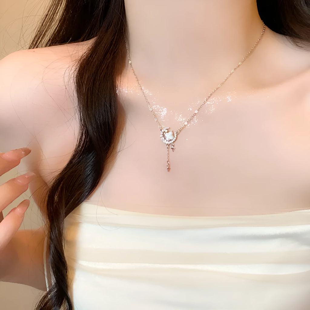 Gold star and moon pendant necklace with zirconium crystal on adjustable copper chain
