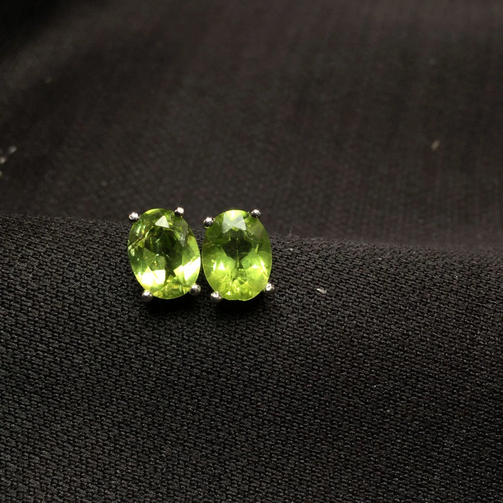 Natural olivine faceted stud earrings in S925 silver with grass green 6×8mm stone