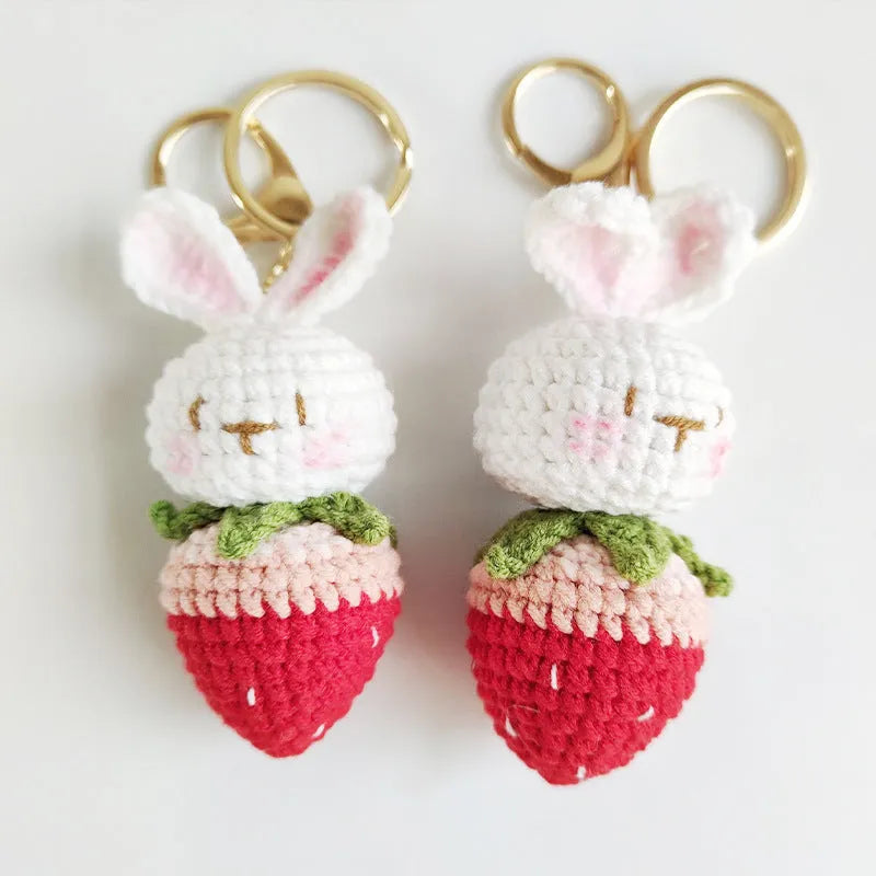 Hand-woven white wire rabbit pendant with strawberry motif and attached key