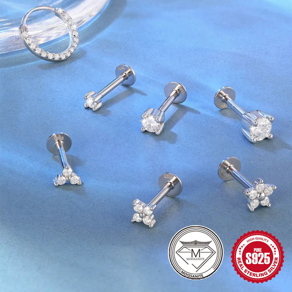 S925 sterling silver geometric stud earrings with petal diamond design, showing triangle and flower shapes.