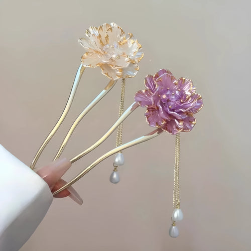 Close-up of a retro-style U-shaped alloy hairpin with a detailed peony flower and tassel design, shown in a purple electroplated finish.