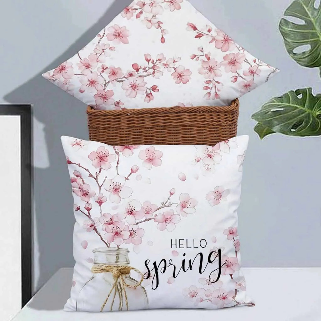 Square cherry blossom letter patterned cushion cover on a sofa, short velvet fabric.