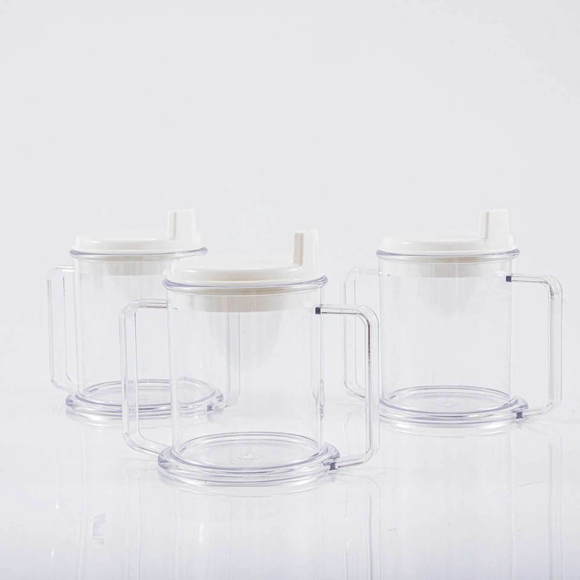 Transparent polypropylene spill-proof drinking cup with modern design.