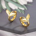 A pair of women's simple fishtail design earrings with an electroplated white gold or yellow gold finish.