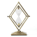 Glass sand timer ornament with zinc alloy metal base showing sand flow timing mechanism