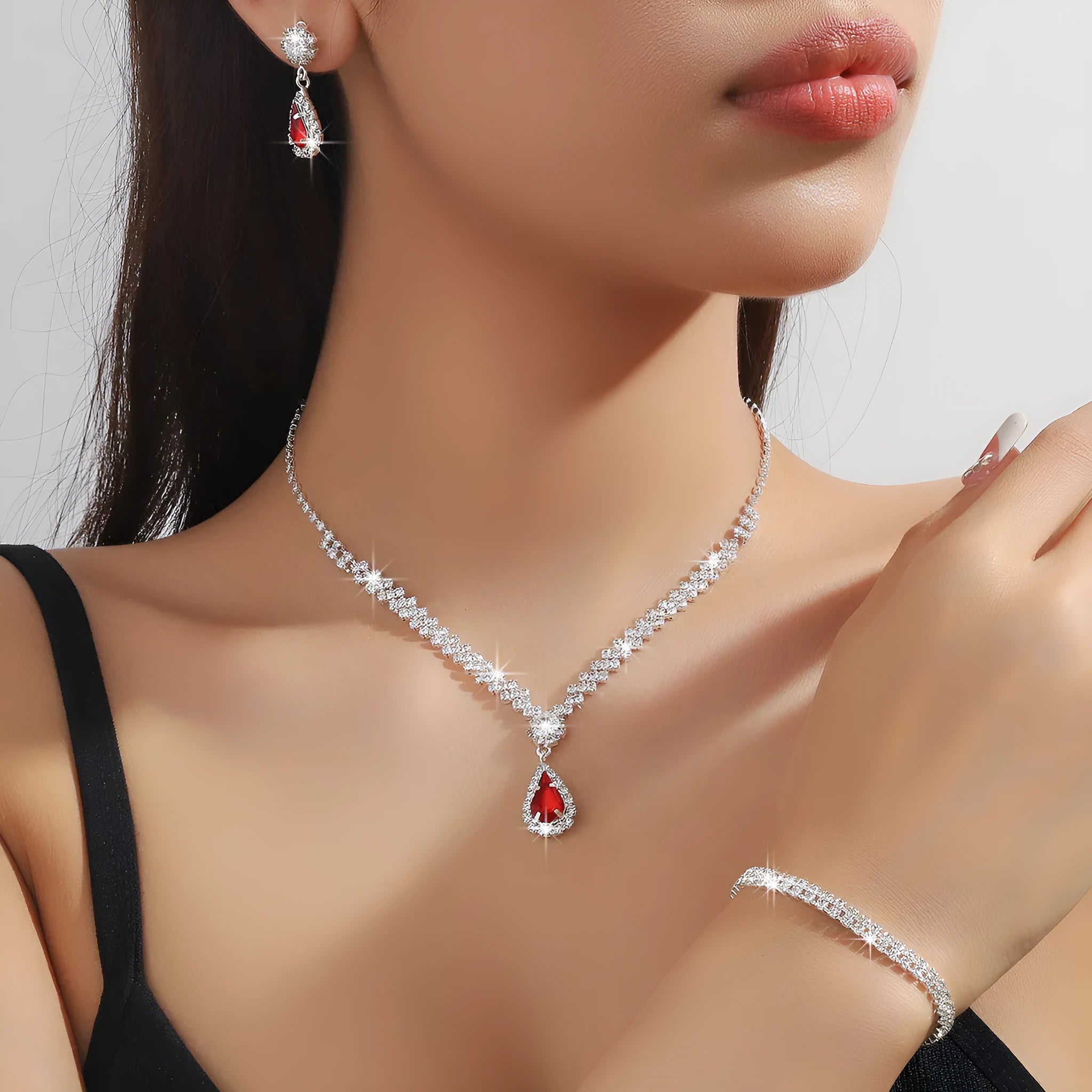 Claw chain necklace and earrings set with water drop rhinestones in multiple colour options