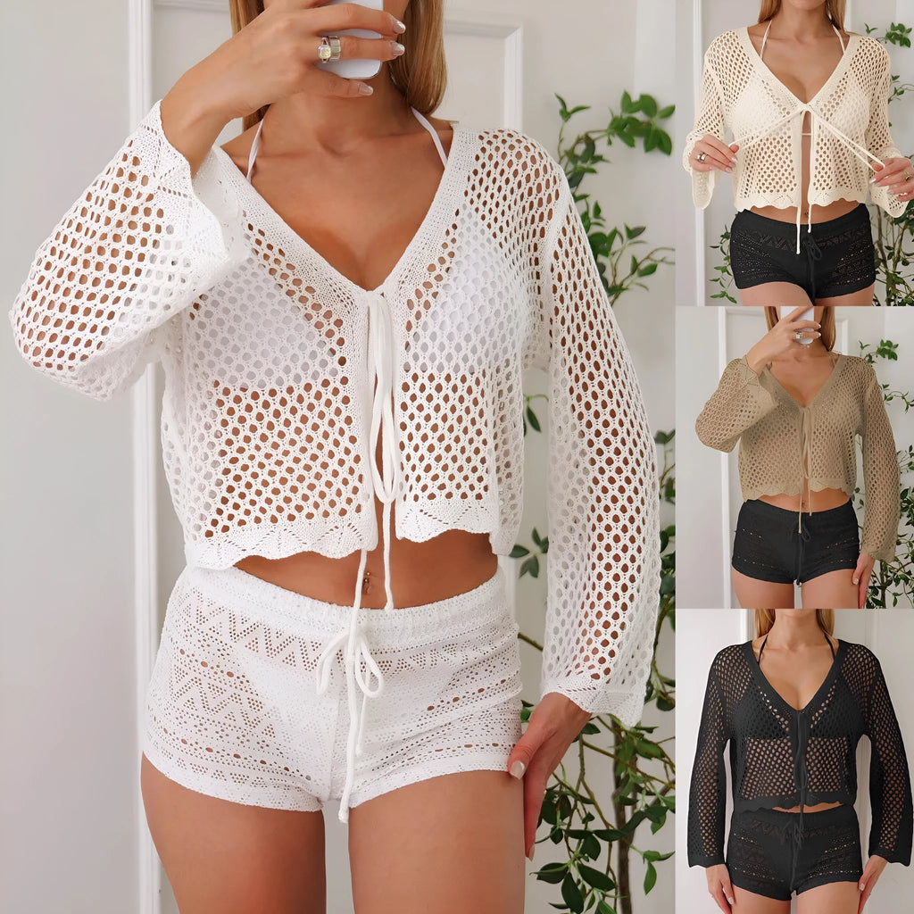 Women's apricot bell sleeve hollow knit cardigan blouse on a hanger.