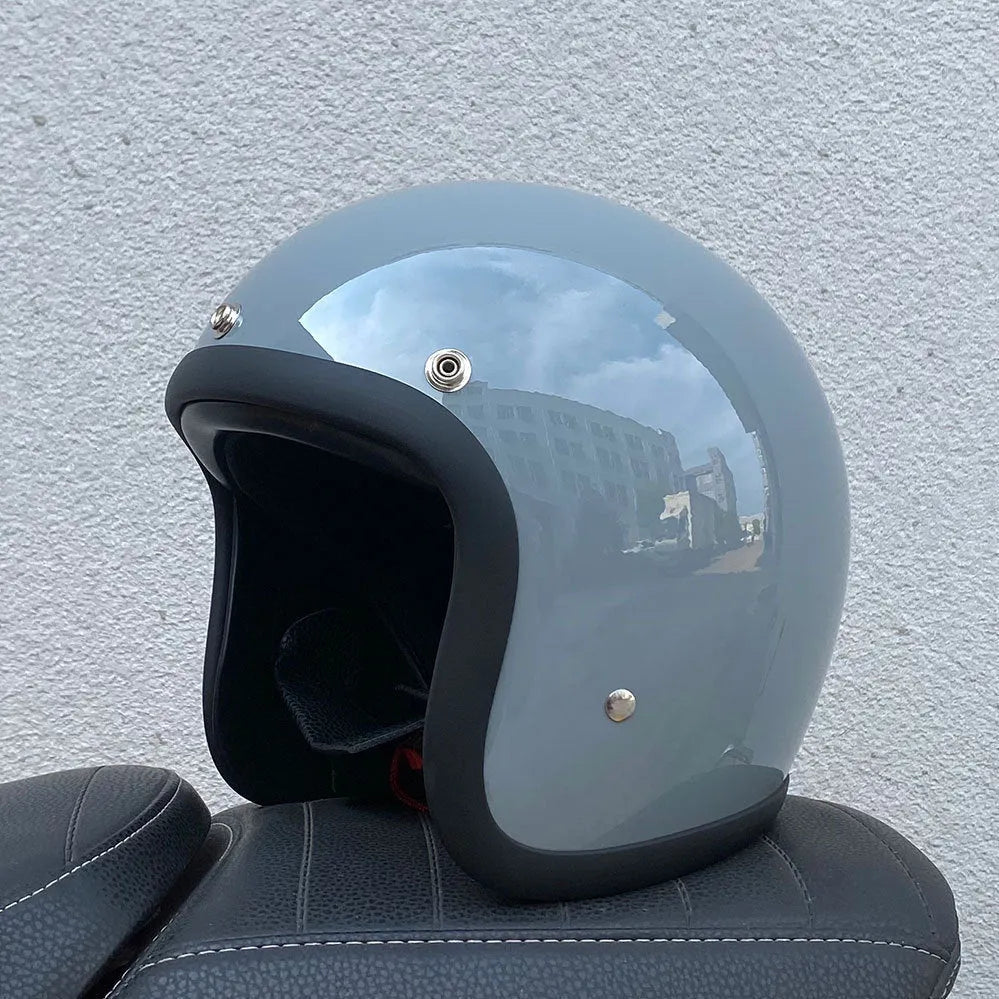 FRP retro-style half motorcycle helmet shown in a cement grey colour variant.