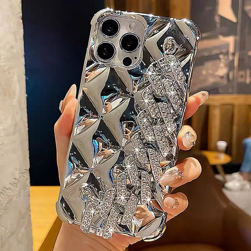 Silver and gold luxury diamond bracelet iPhone cases with chain strap and lock charm for various models.