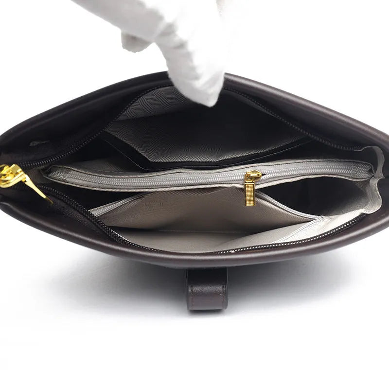 Korean style black bucket messenger bag with double shoulder straps and internal compartments