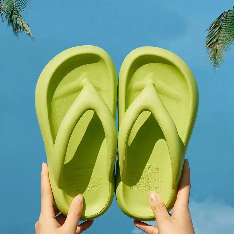 Solid colour thick-soled flip flops with decorative bow and injection moulded EVA construction