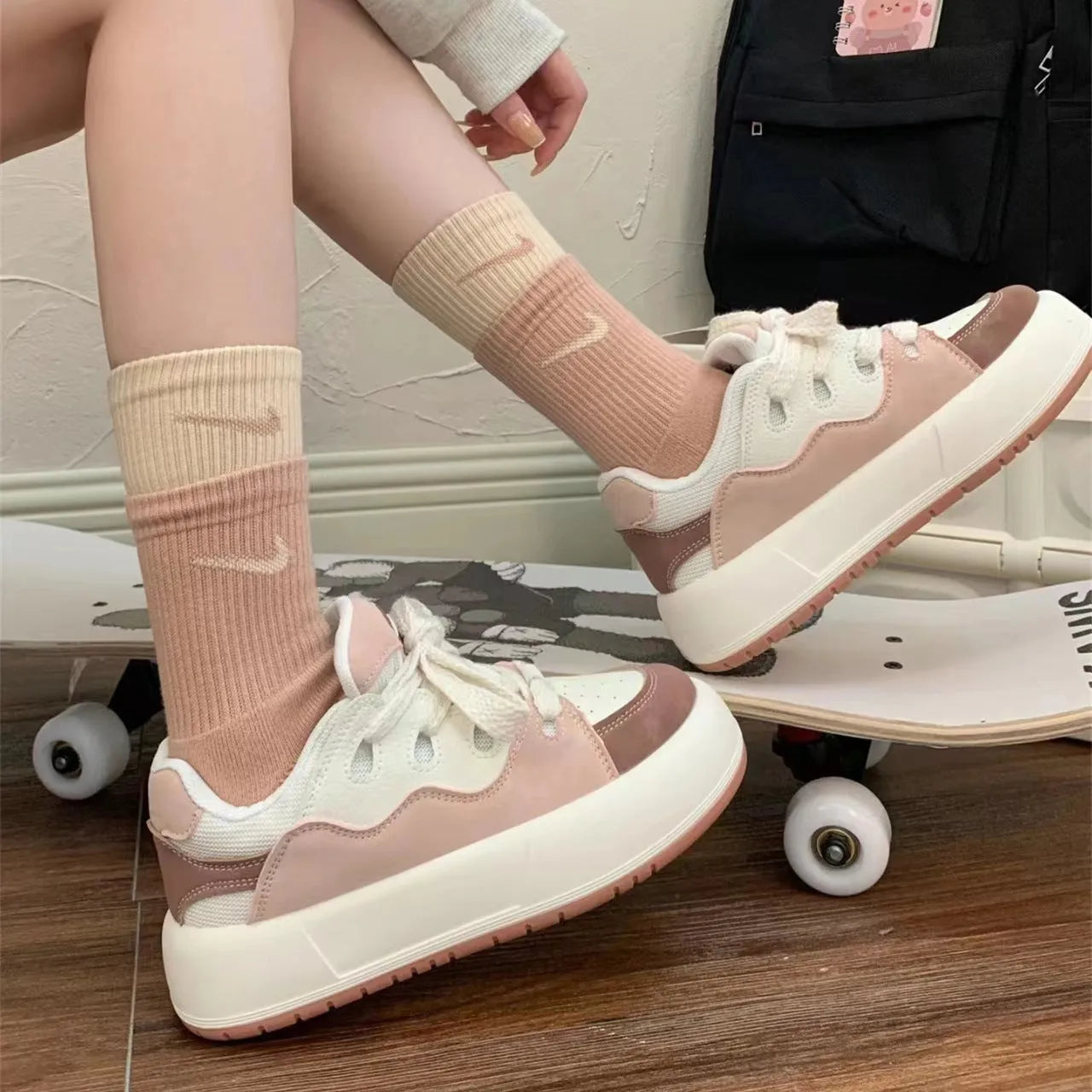 Green women's flat casual sneakers with a round toe and breathable PU mesh upper.