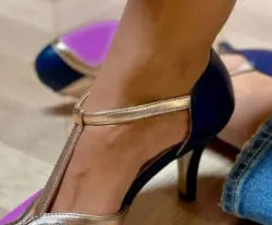 Round toe high heels with button closure in artificial PU and rubber, available in sizes 34-43