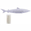 Green silicone fish-shaped chew toy for cats on a white background, showing side breathable holes.