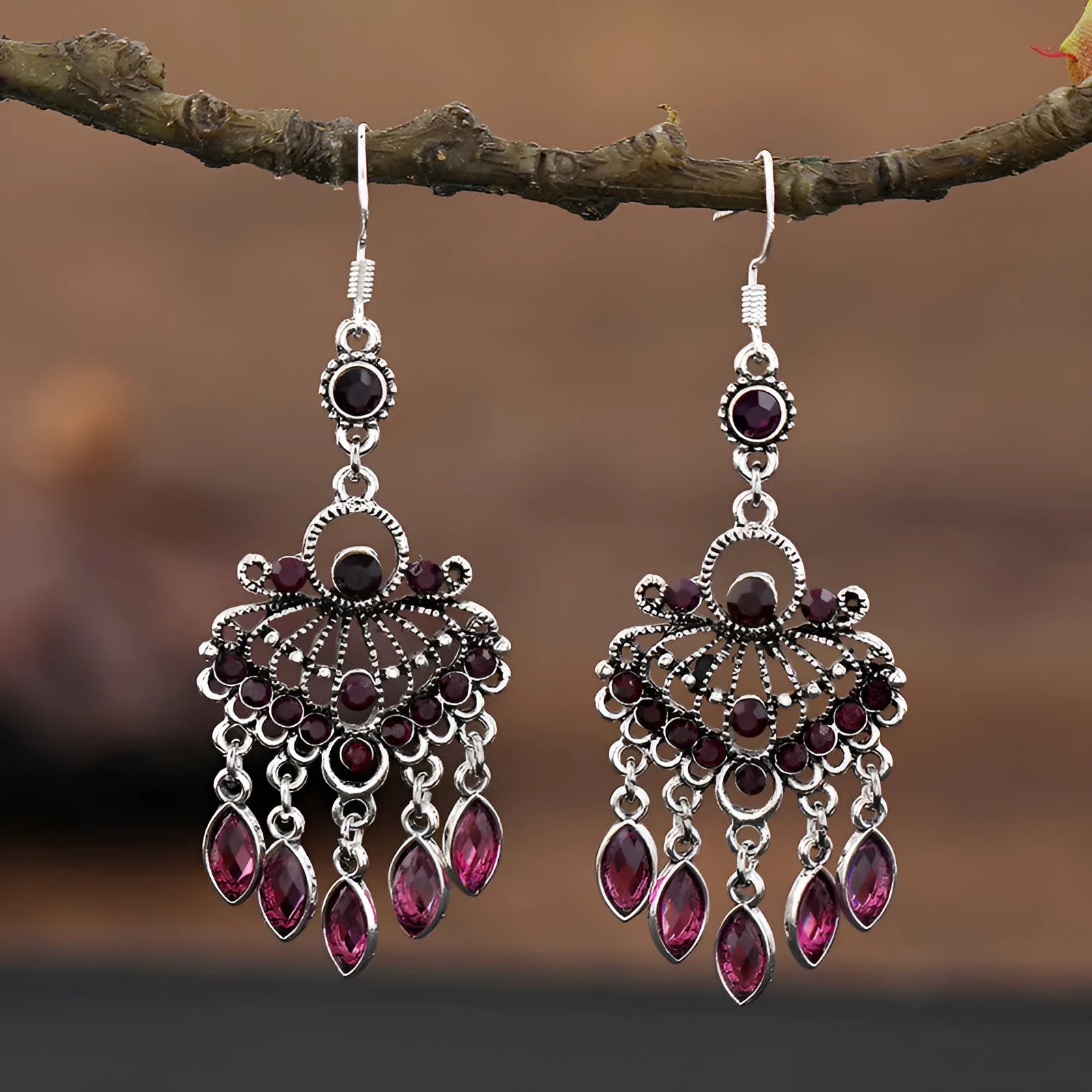 Retro purple drop earrings with long fringe detailing and ethnic design elements