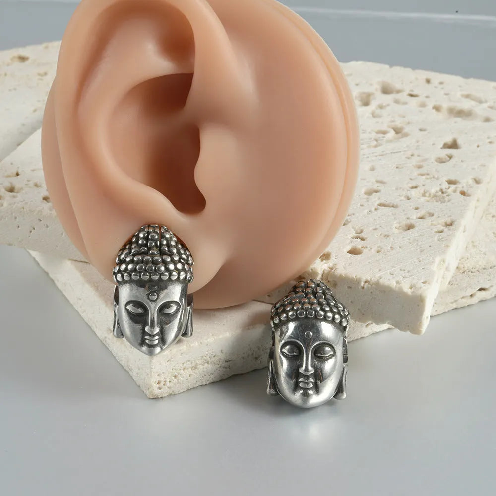 Stainless steel hollow skull Buddha earrings with geometric hip hop design in electroplated finishes