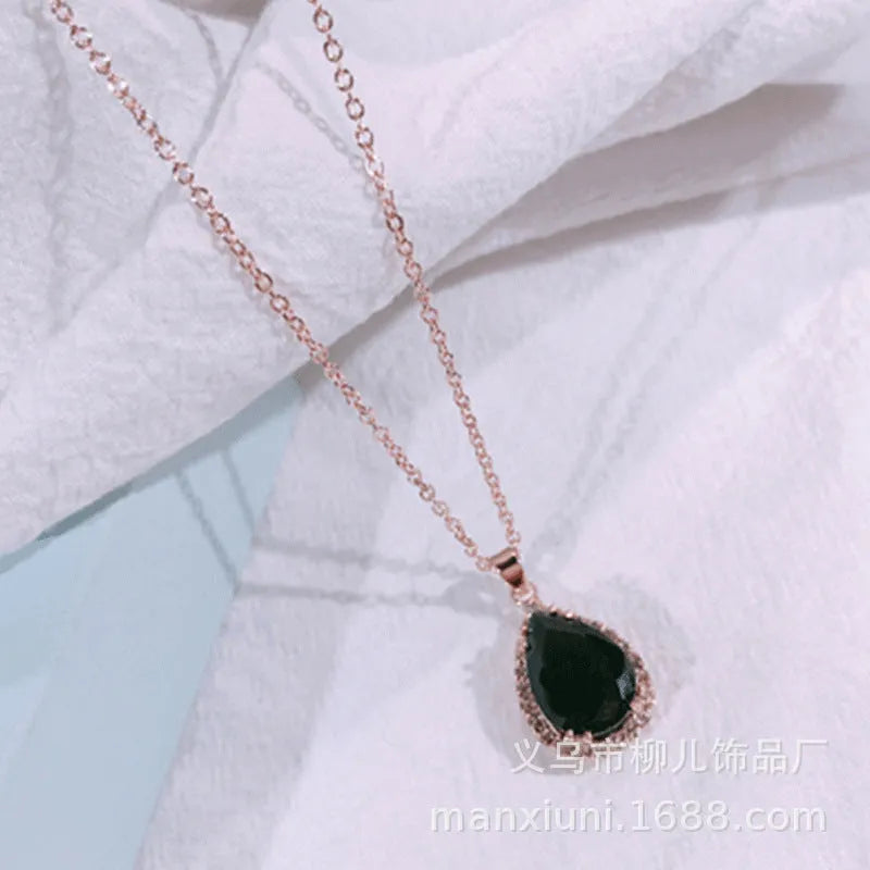 Drop shape geometric pendant necklace with rhinestone inlay in pink rose gold electroplated finish