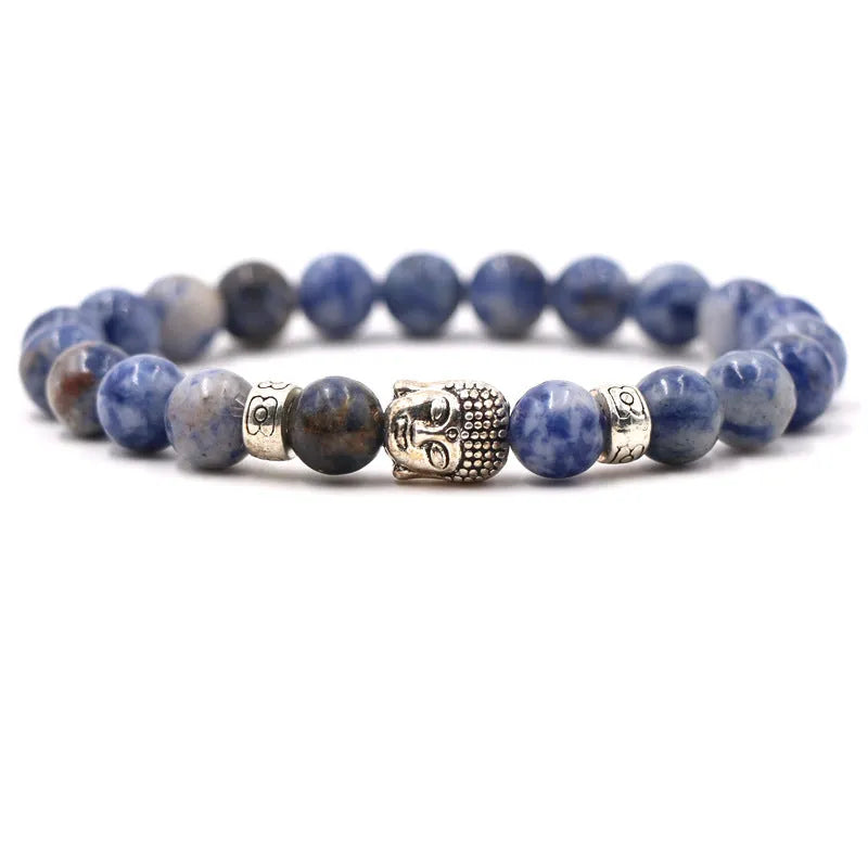 Natural stone stretch bracelet with tigereye, volcanic rock and turquoise beads on wrist