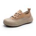 Women's cowhide leather platform sneakers in matcha green with front lace-up design.