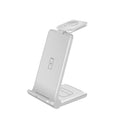 White 3-in-1 foldable wireless charging station showing iPhone, AirPods, and Apple Watch charging simultaneously