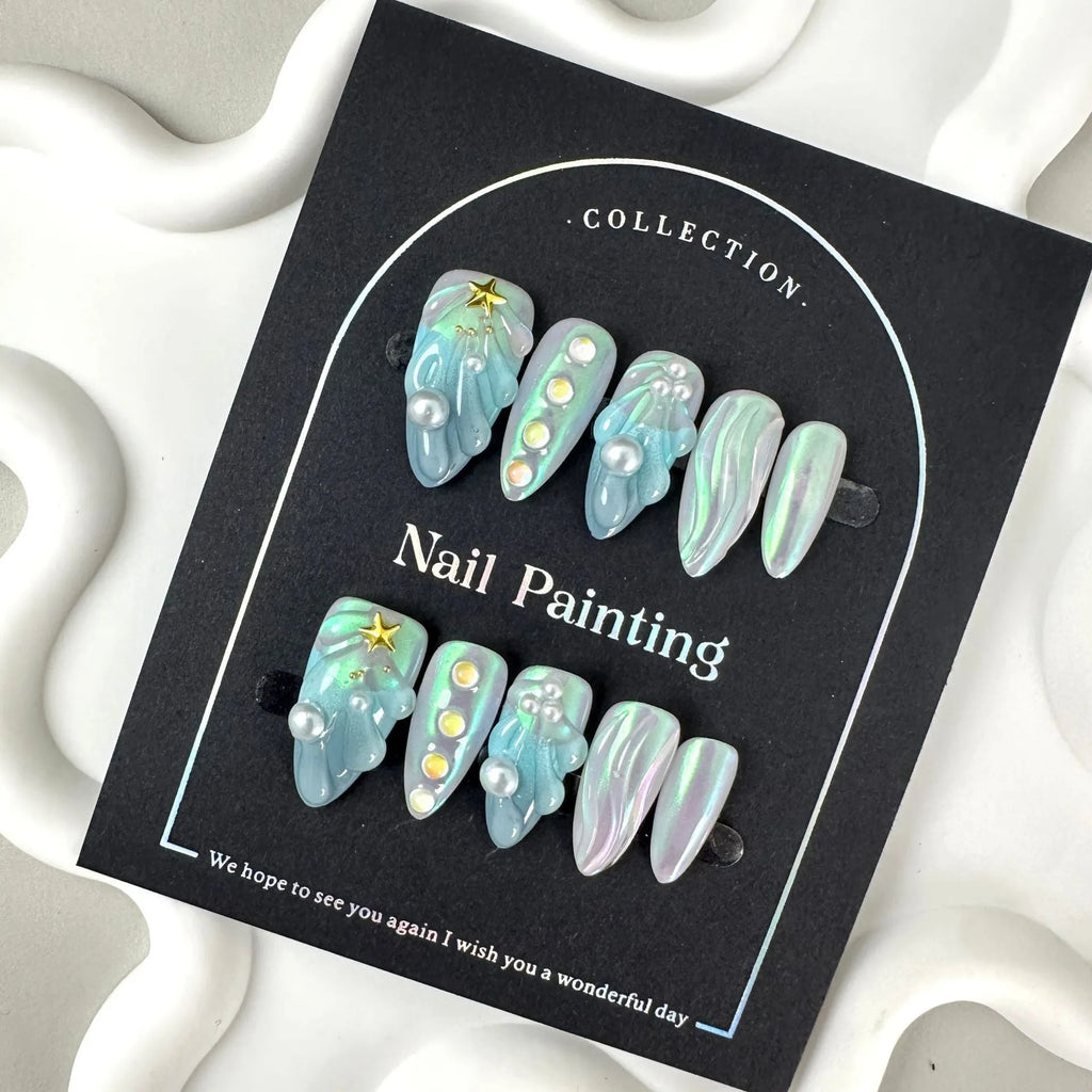 Blue plastic nail tip shells in four sizes for nail extensions and decorative manicures