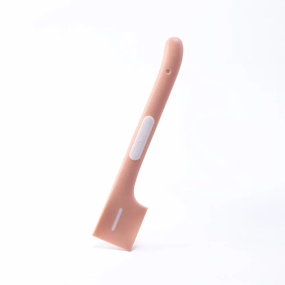 Green long-handle pet feeding spoon for canned cat and dog food on a white background.
