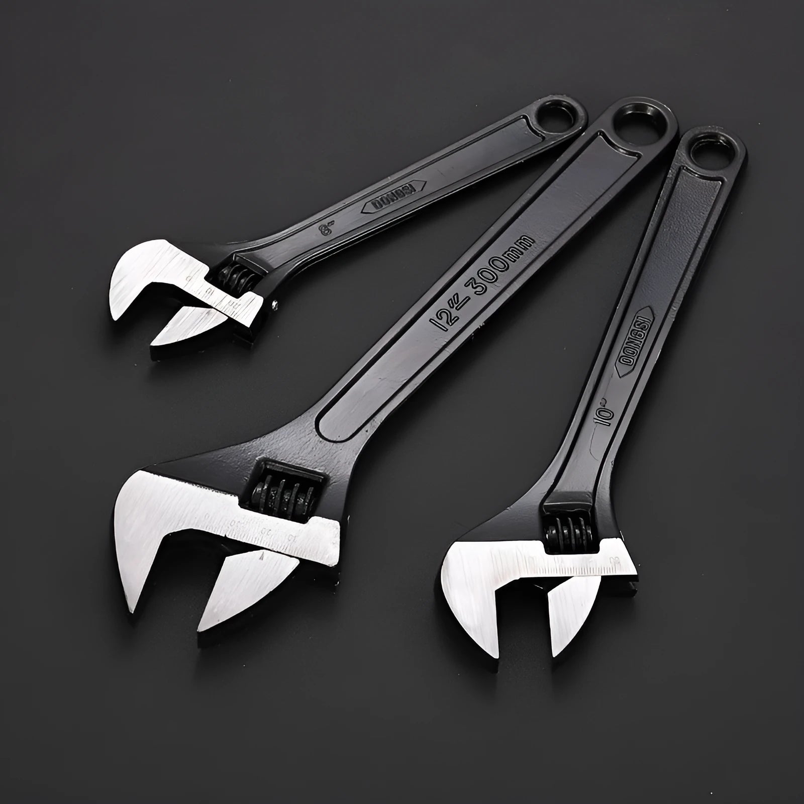High-carbon steel open-end adjustable wrench with black finish on ergonomic handle.