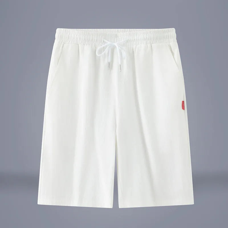 Cotton and linen cropped trousers with drawstring waist in solid colour on hanger