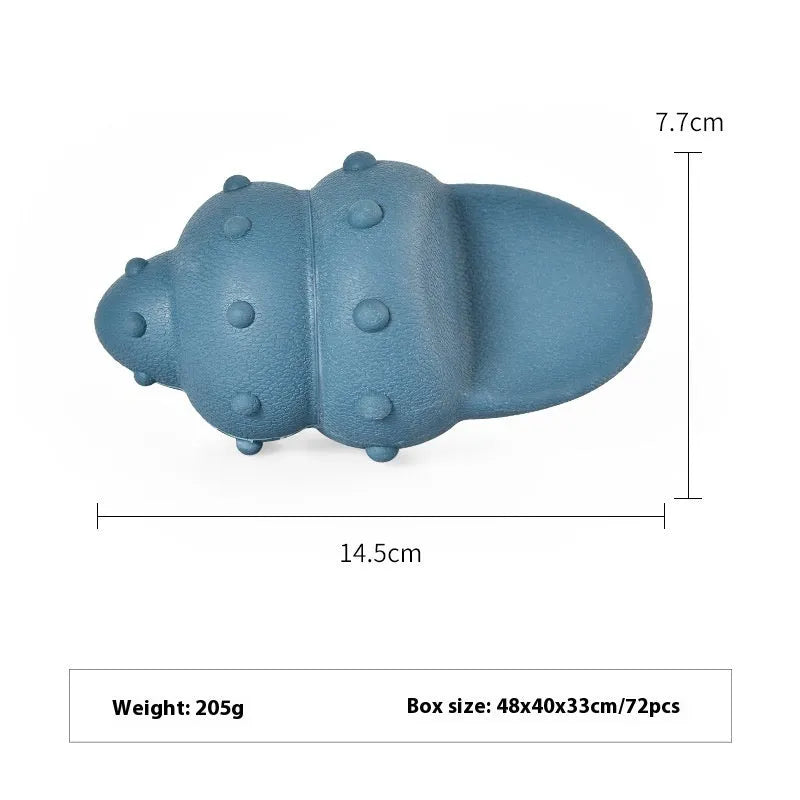 Blue rubber dog toy shaped like a shark conch for food dispensing and chewing.
