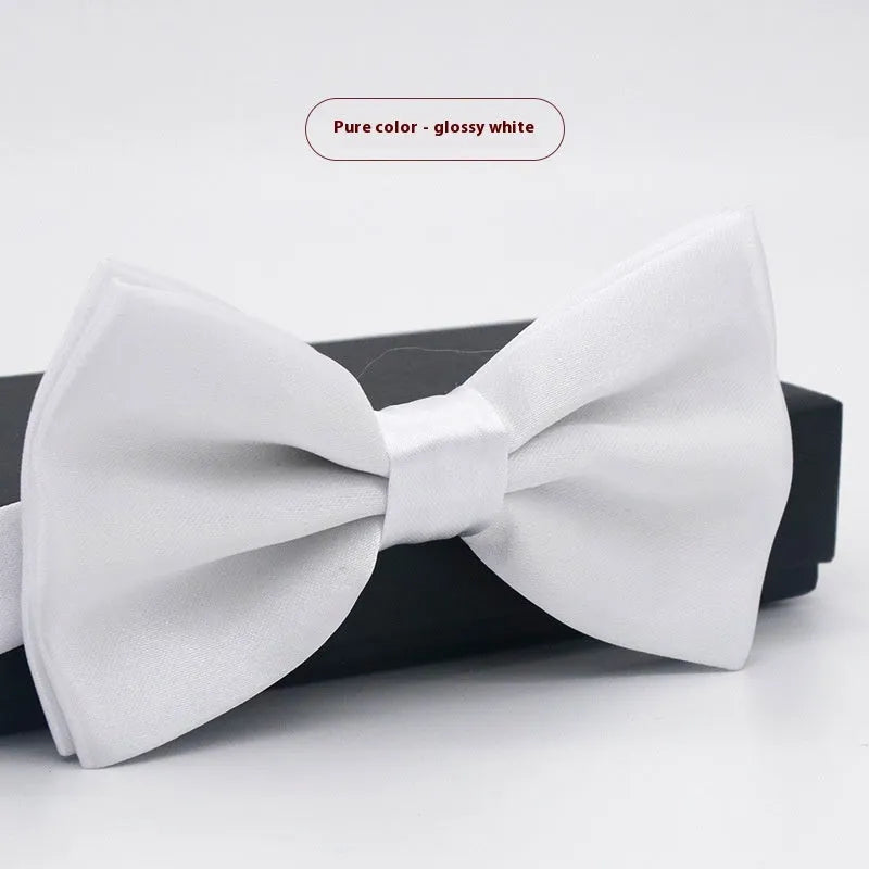 Men's flat head solid colour bow tie in polyester, showing 12cm by 6cm size on a background.