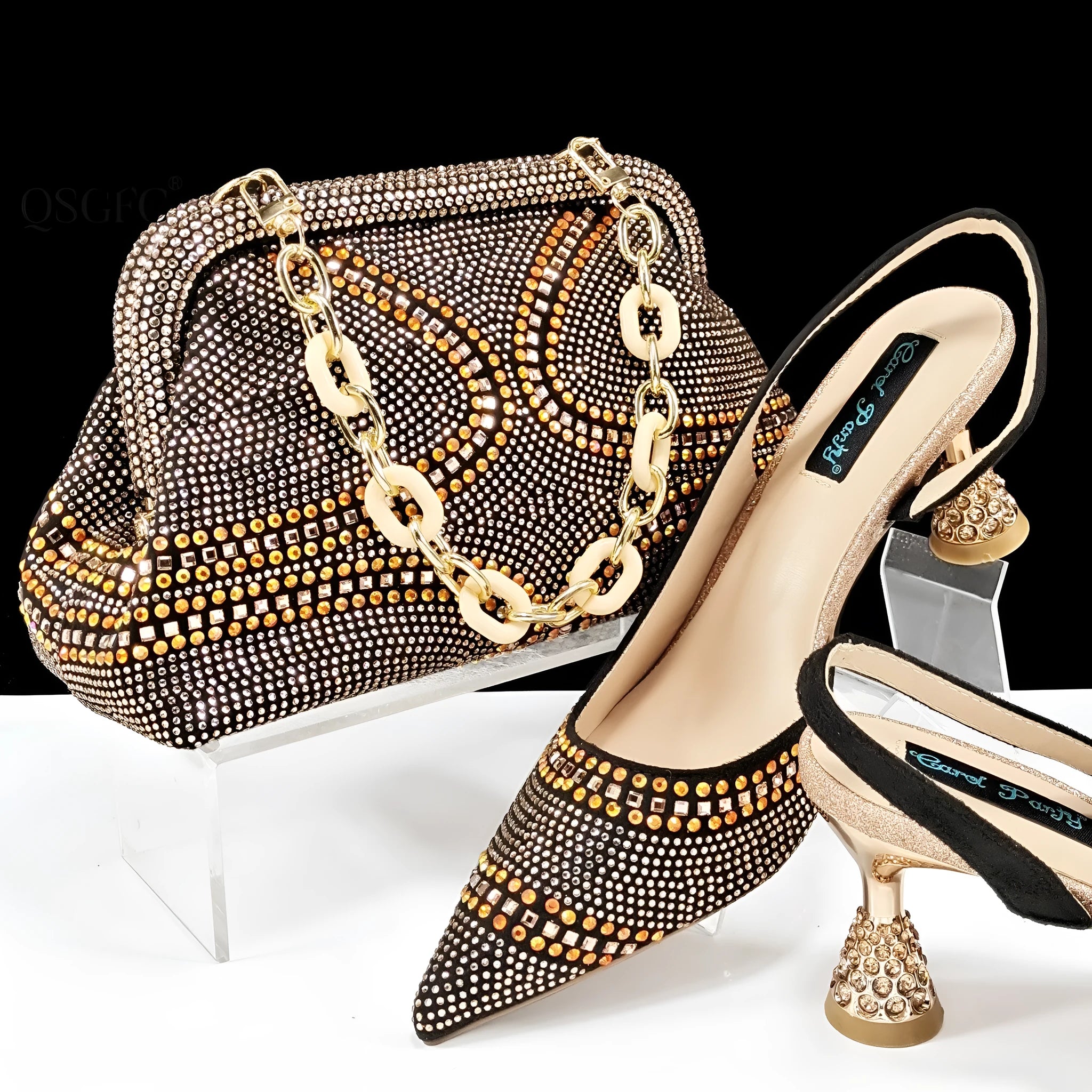 Women's pointed-toe high heel shoes with matching bag, featuring a stiletto heel and rhinestone detail on a synthetic leather upper.