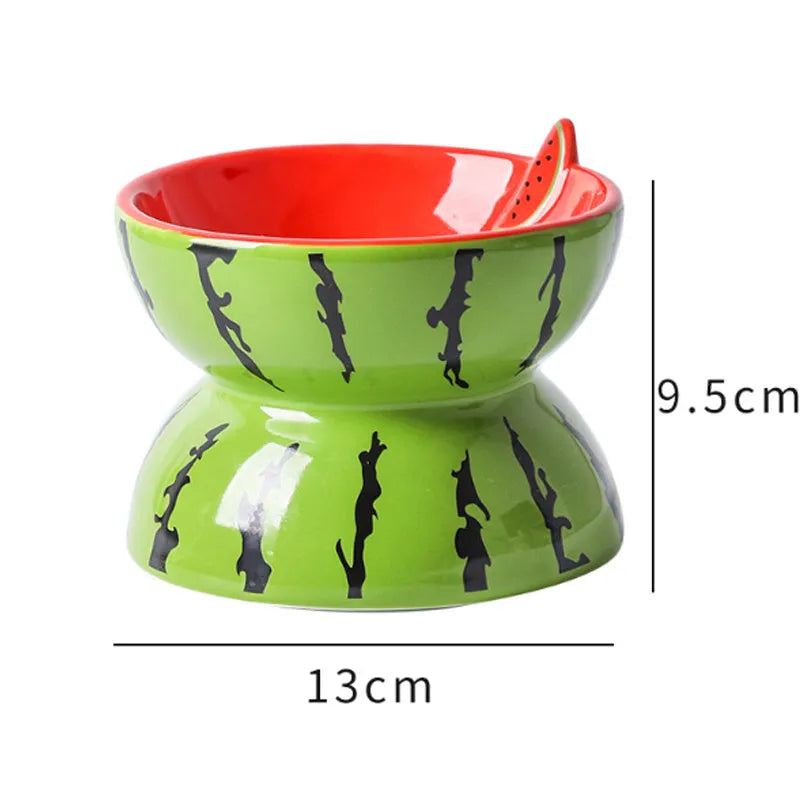 Orange ceramic raised cat bowl with tilted design and non-slip base.