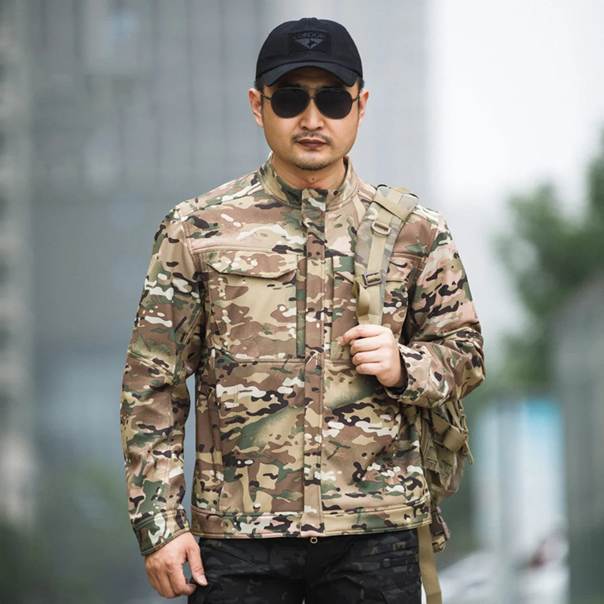 Bone Frog Peak Breaker soft shell tactical jacket in black, shown for outdoor mountaineering use.